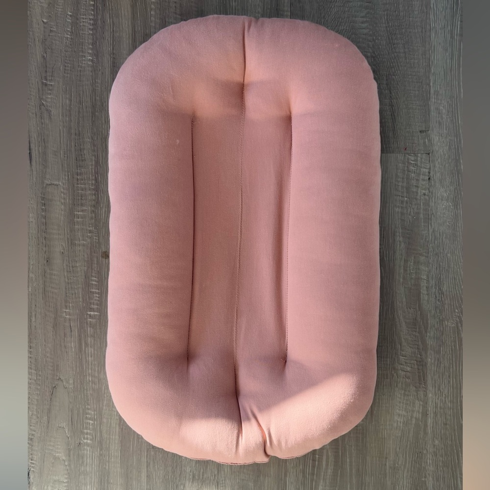 Snuggle Me organic rose colored infant lounger